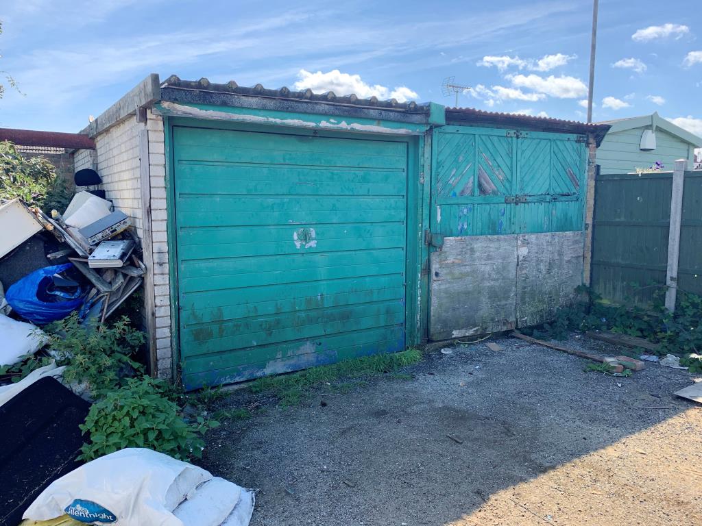 Lot: 30 - PAIR OF FREEHOLD LOCK-UP GARAGES - Library Photograph taken 2020